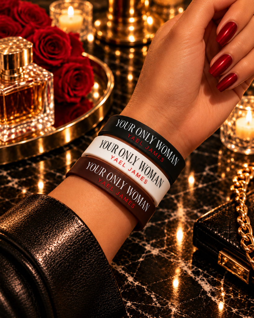 White, black and brown YOUR ONLY WOMAN bracelets by YAEL JAMES worn together on a wrist.